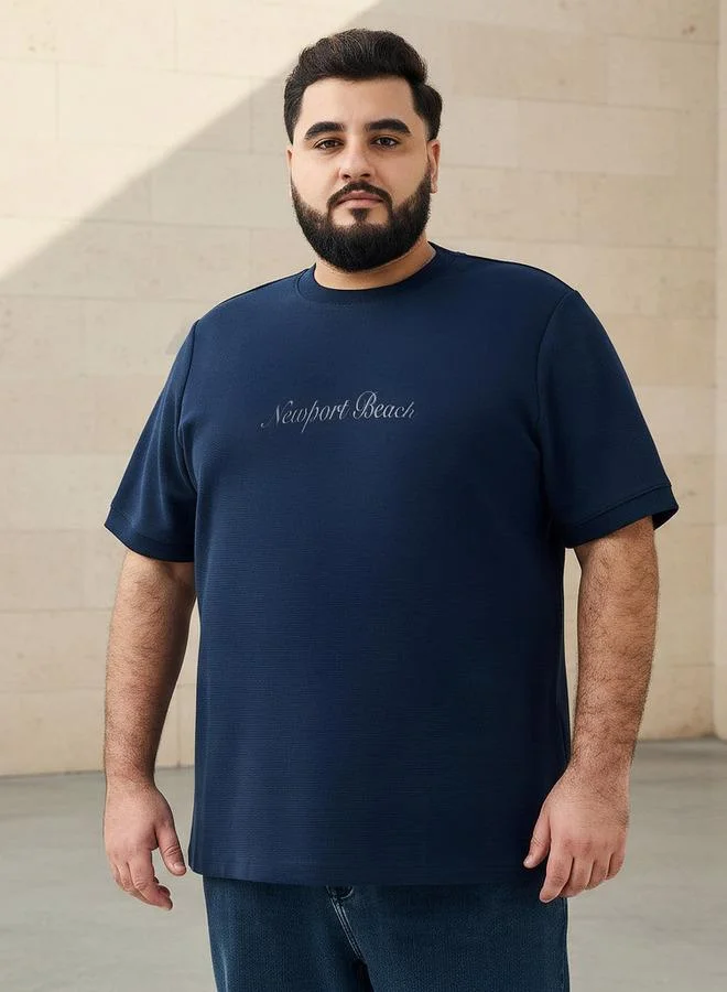 ماكسيم تيشيرت رجالي بطبعة شاطئ نيوبورت بياقة دائرية وأكمام قصيرة